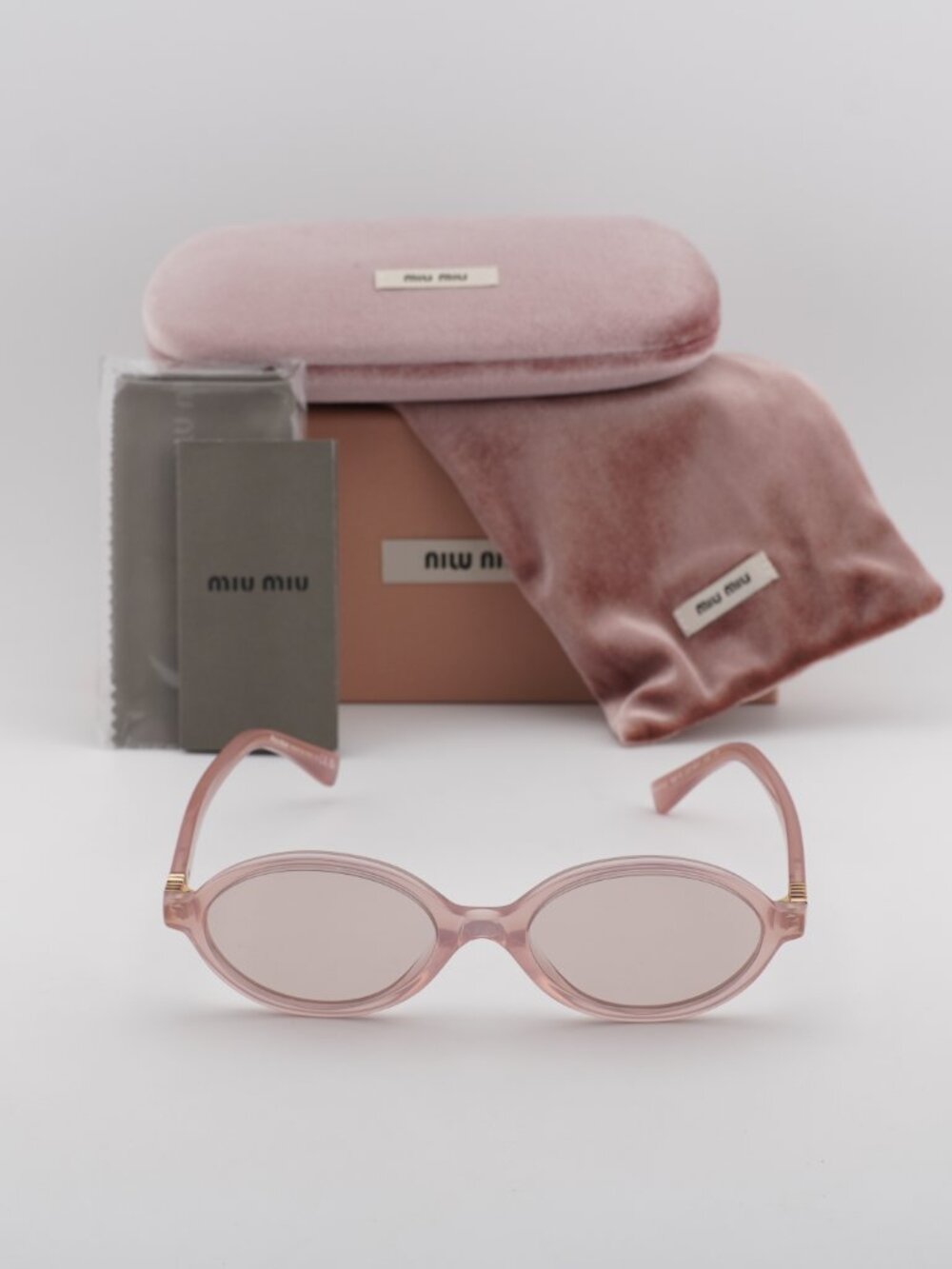 Miu Miu MU04ZS 20I60V Oval Sunglasses – Opaline Pink\Pink - Picture 3 of 7